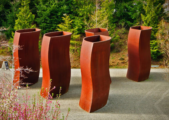 Bom preço. Plantadores abstratos da flor do metal, potenciômetros de aço originais de Corten que soldam o ofício on-line